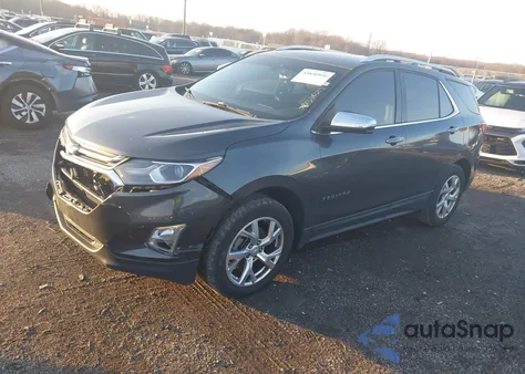 2018 Chevrolet Equinox Premier z USA, uszkodzony, nr VIN 2GNAXVEV9J6320399